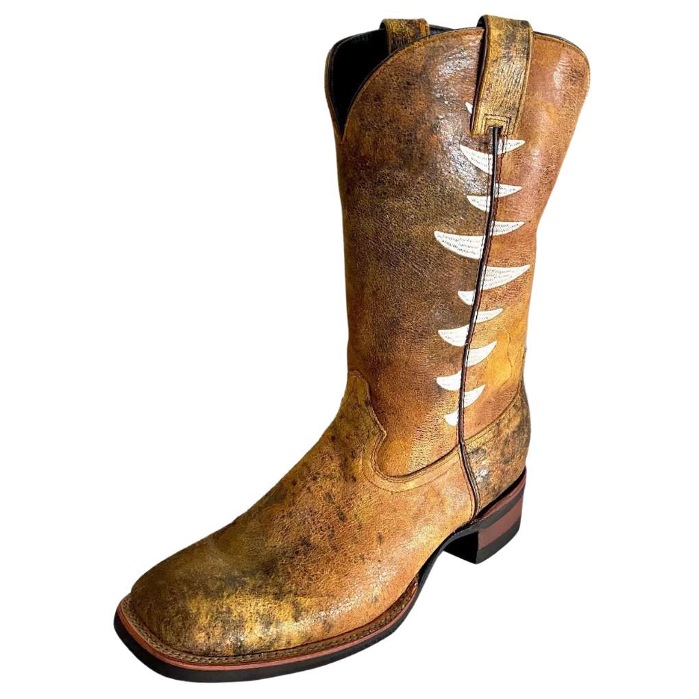 Side view of hand finished Kader Wyndham boots. Stitched trims in side welt look like teeth. Square toe with rubber sole.
